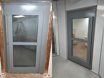 Low closing force door with transparent windows