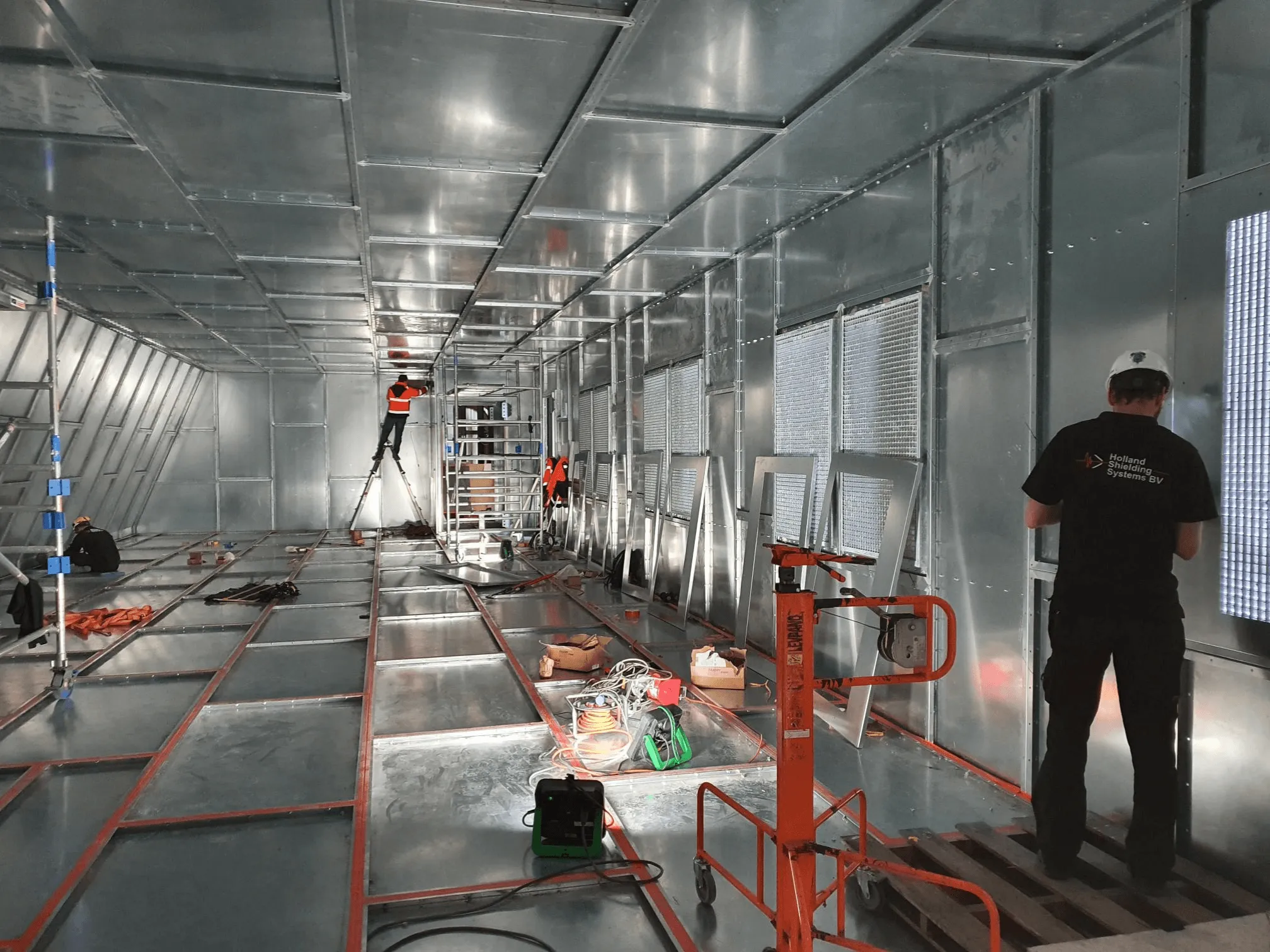 Specialized magnetic shielding TEMPEST rooms and welded EMP shielded constructions