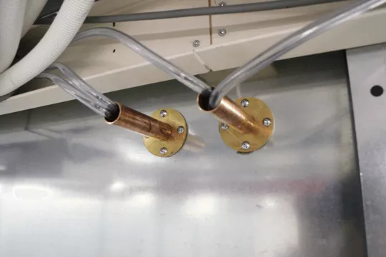 Waveguide with condensate hoses